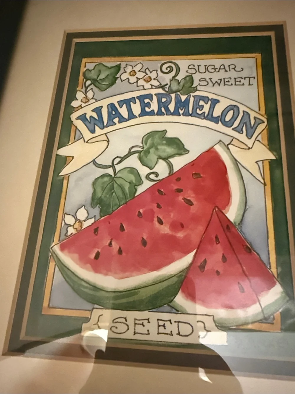 “Large Watermelon Seed Packet” framed picture of a watermelon seed packet.